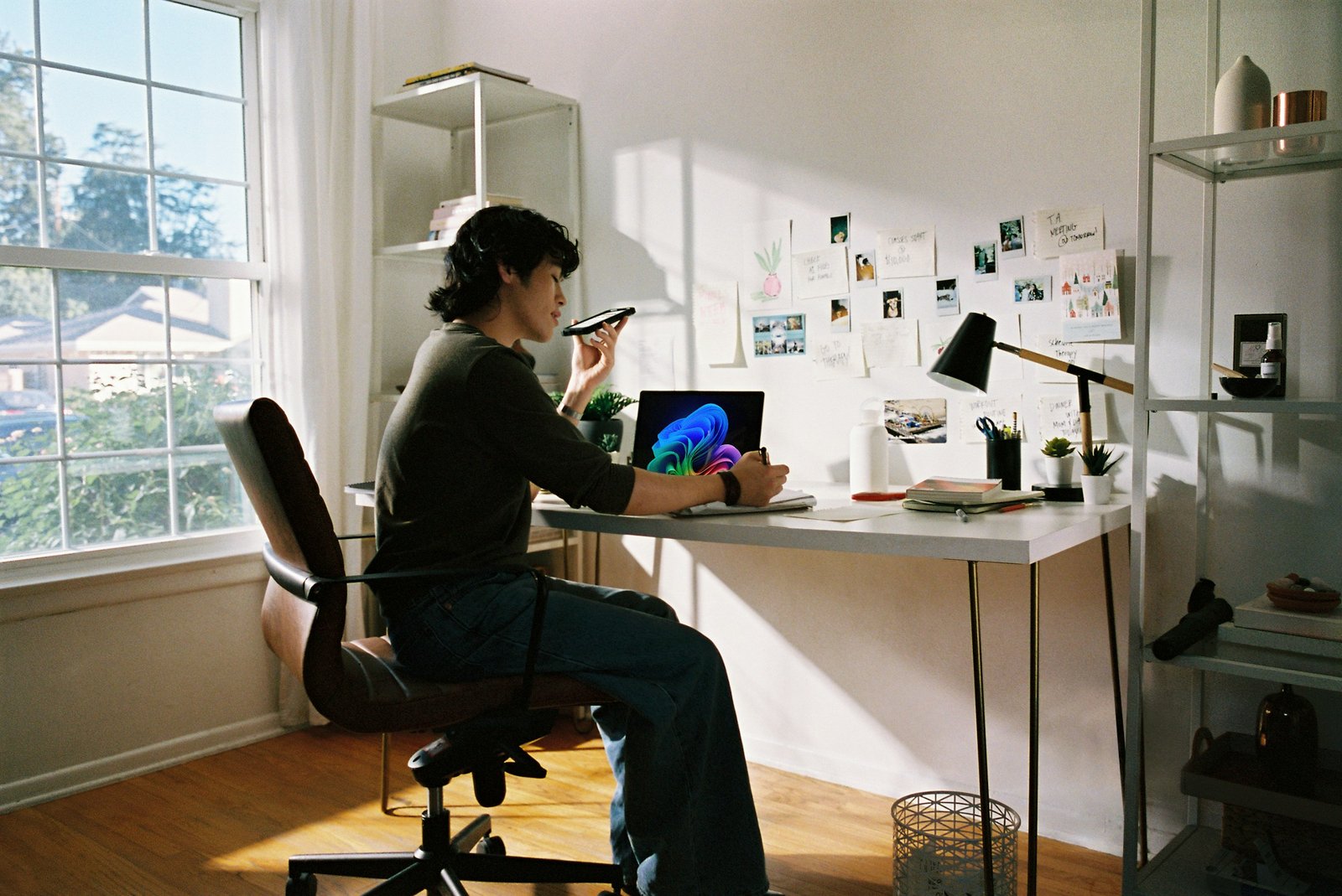 Hands typing on a laptop to address frequently asked questions about hiring freelancers.