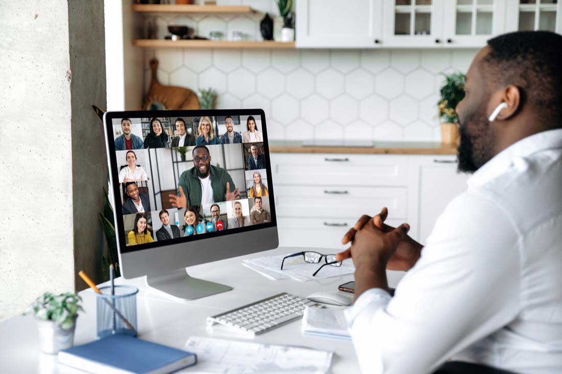 A laptop and monitor setup used to track the duration of remote work.